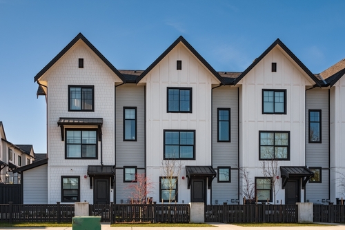 Modern townhouse units highlighting homeowners and townhouse insurance coverage protection